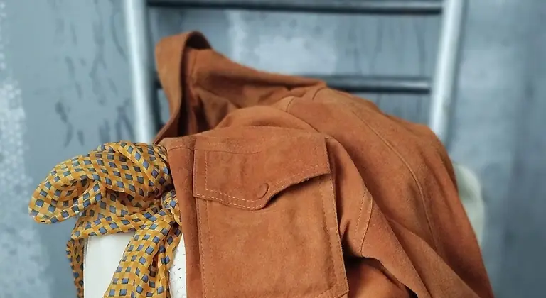 A suede jacket ready for leather and fur cleaning